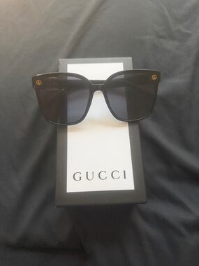 Gucci Black Sunglasses with Gold GG Accents